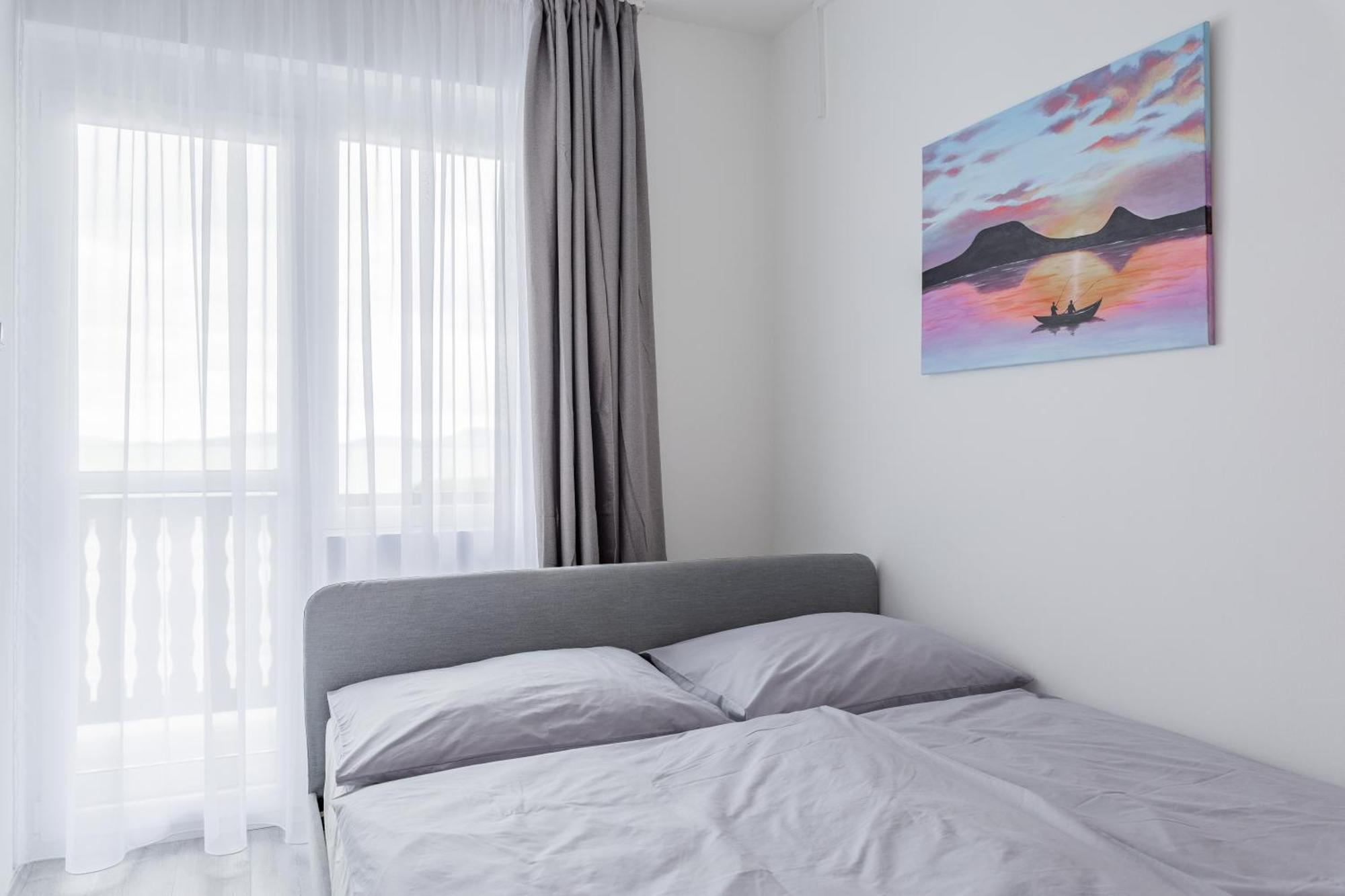 Balaton a kertben - Közvetlen vízparti apartmanok, csodálatos panorámával Balatonfenyves Habitación foto