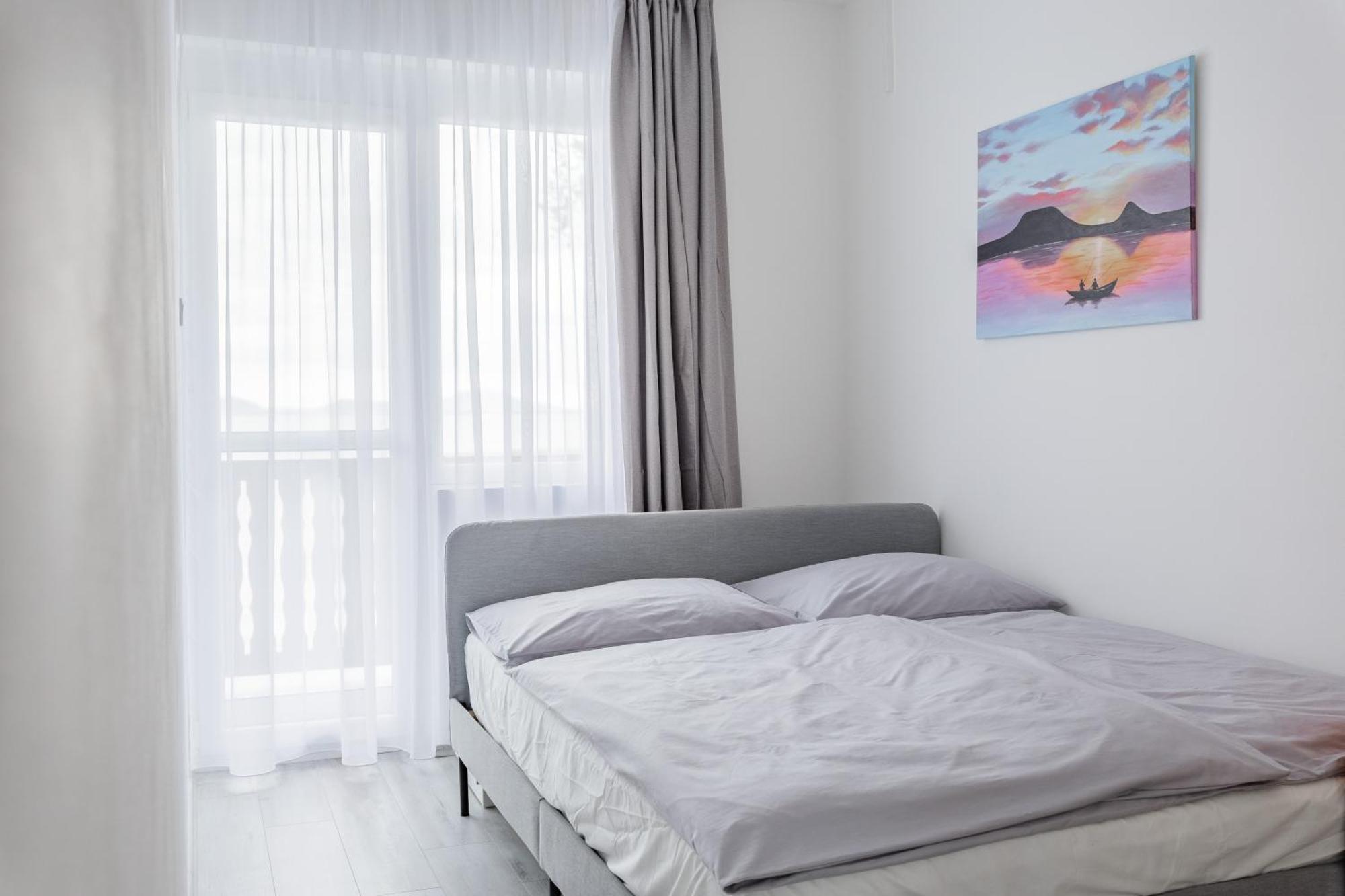 Balaton a kertben - Közvetlen vízparti apartmanok, csodálatos panorámával Balatonfenyves Habitación foto